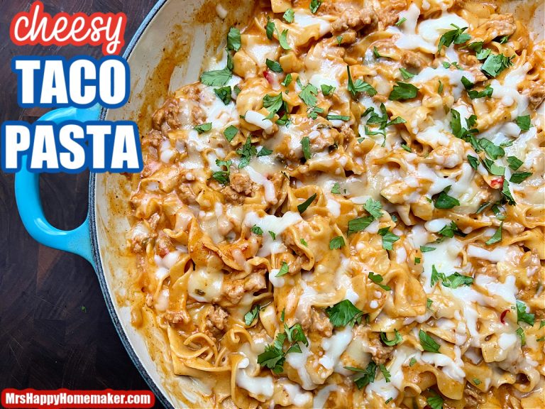 Cheesy Taco Pasta in a round blue baking dish